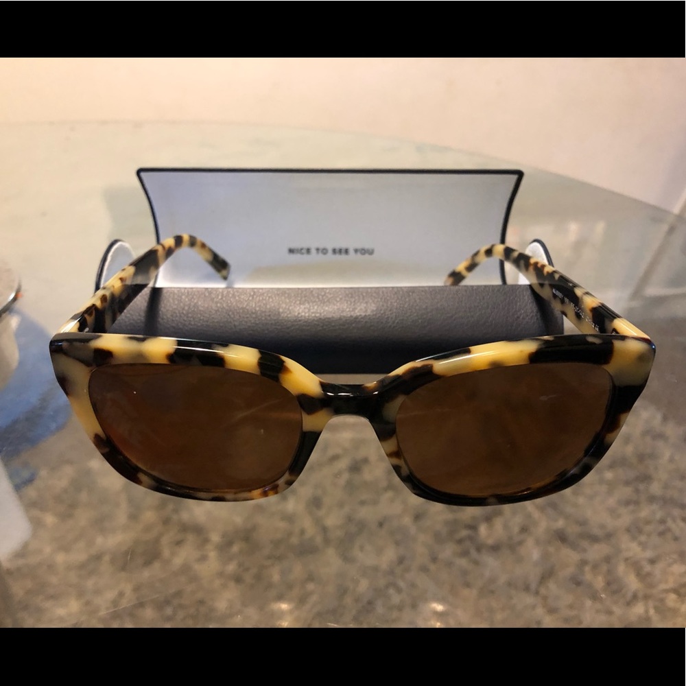 Warner Parker brown and cream color frames
